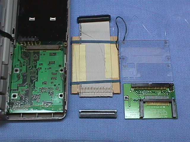 Parts to install a CF to IDE adapter in a Toshiba T2100.