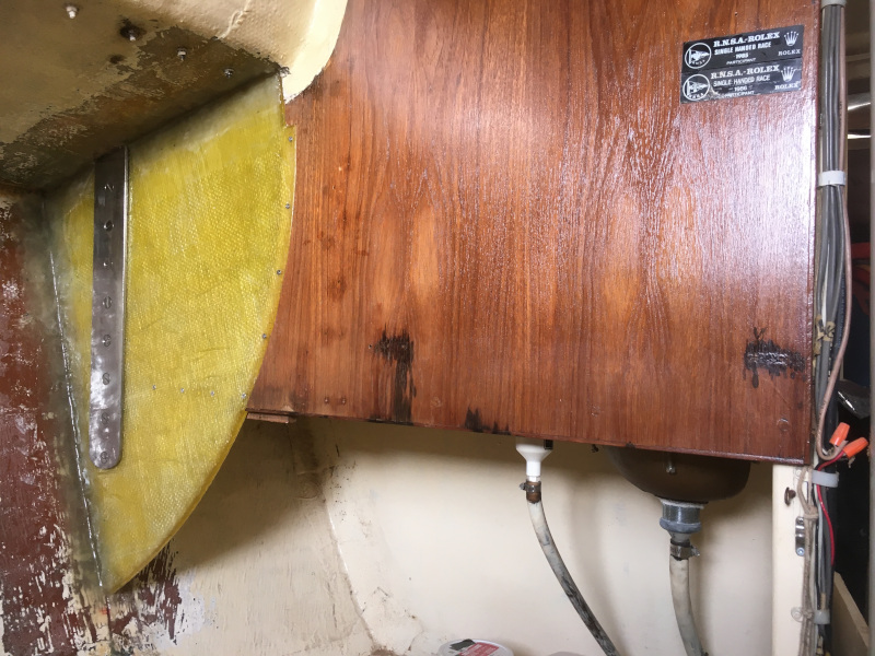 Port bulkhead with new section of epoxy-fiberglass installed.